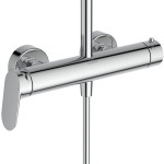 Shower tap with showerpipe and overhead shower Wall-mounted material: Brass mixer 111.7cm, Ø26cm, with a 2-way handshower & 1.75cm shower hose, color: Chrome surface: Glossy Wall-mounted exposed with showerpipe and overhead shower